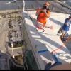 Melanie Reed hangs "Over The Edge" 289 above street level as she starts down the side of the Four Seasons Hotel on the STL riverfront